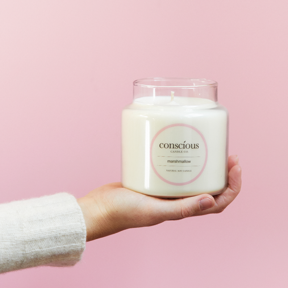 Large Mashmallow scented Natural Soy Wax Candle in hand